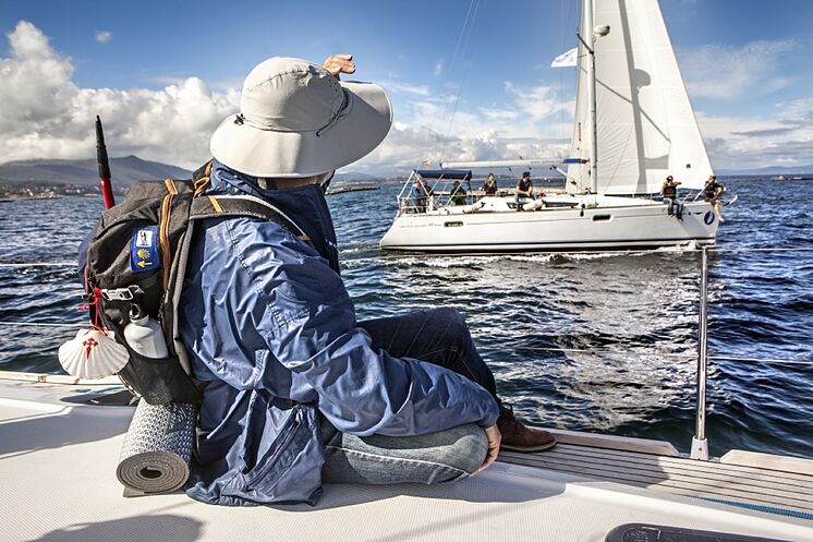 A pilgrim aboard a sailboat to Santiago.