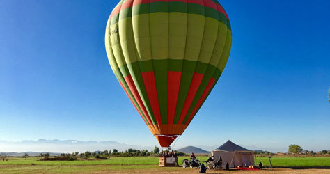 A balloon ride through the oases scattered around the mountains of Jbilet.